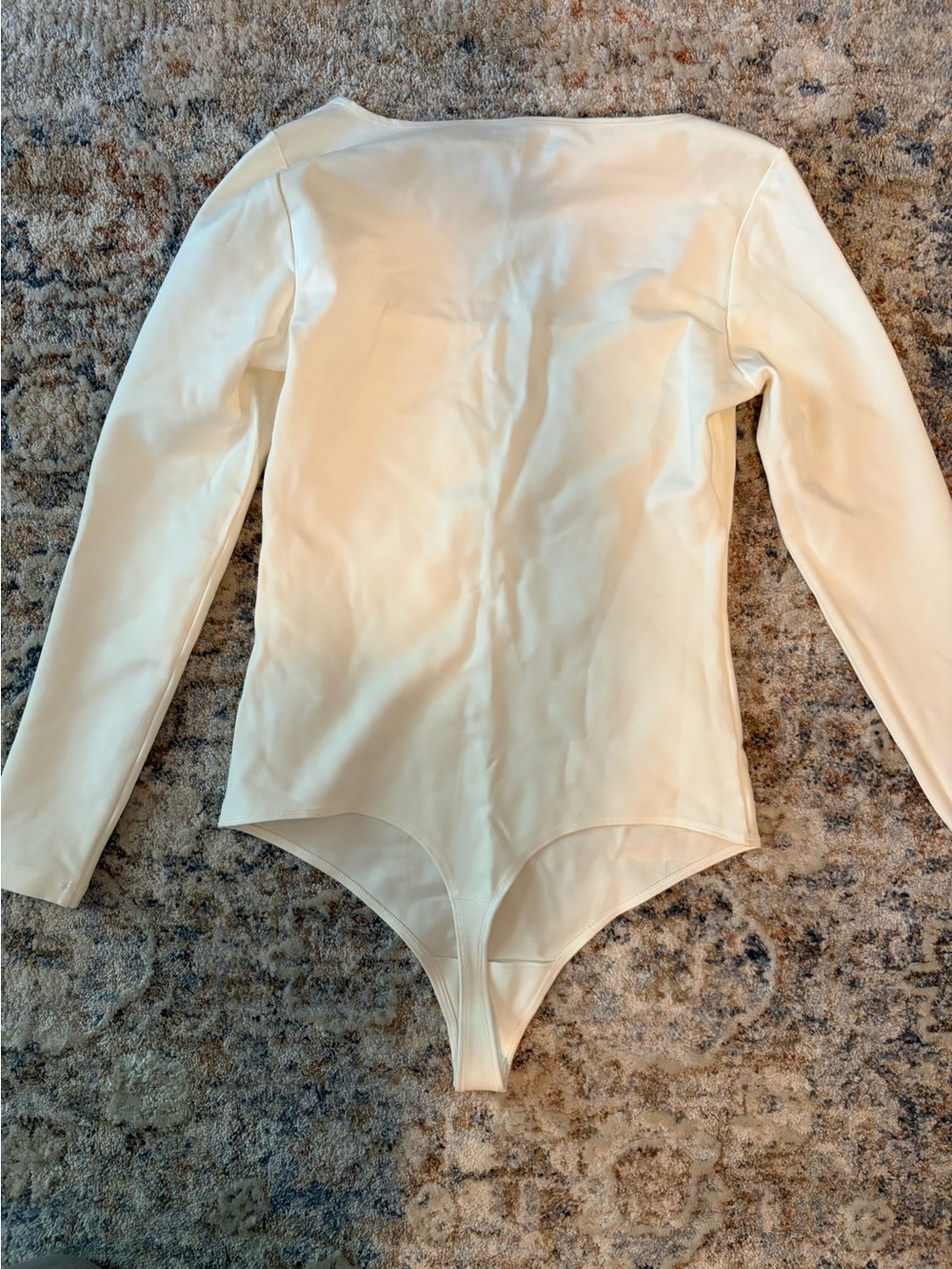 NWOT Long Sleeve One-Piece Bodysuit in Cream